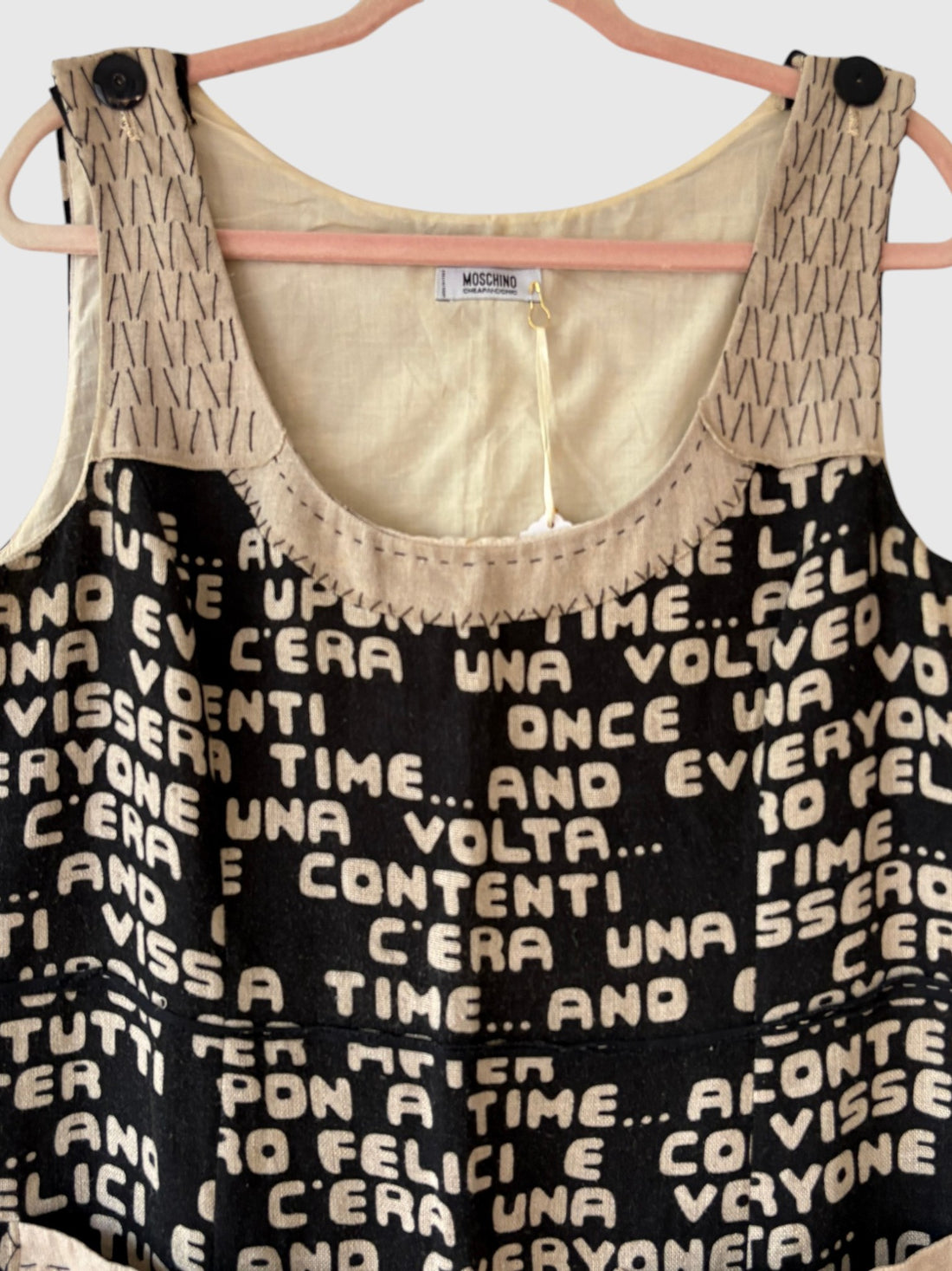 Moschino storybook typography print and contrast stitched neckline detail