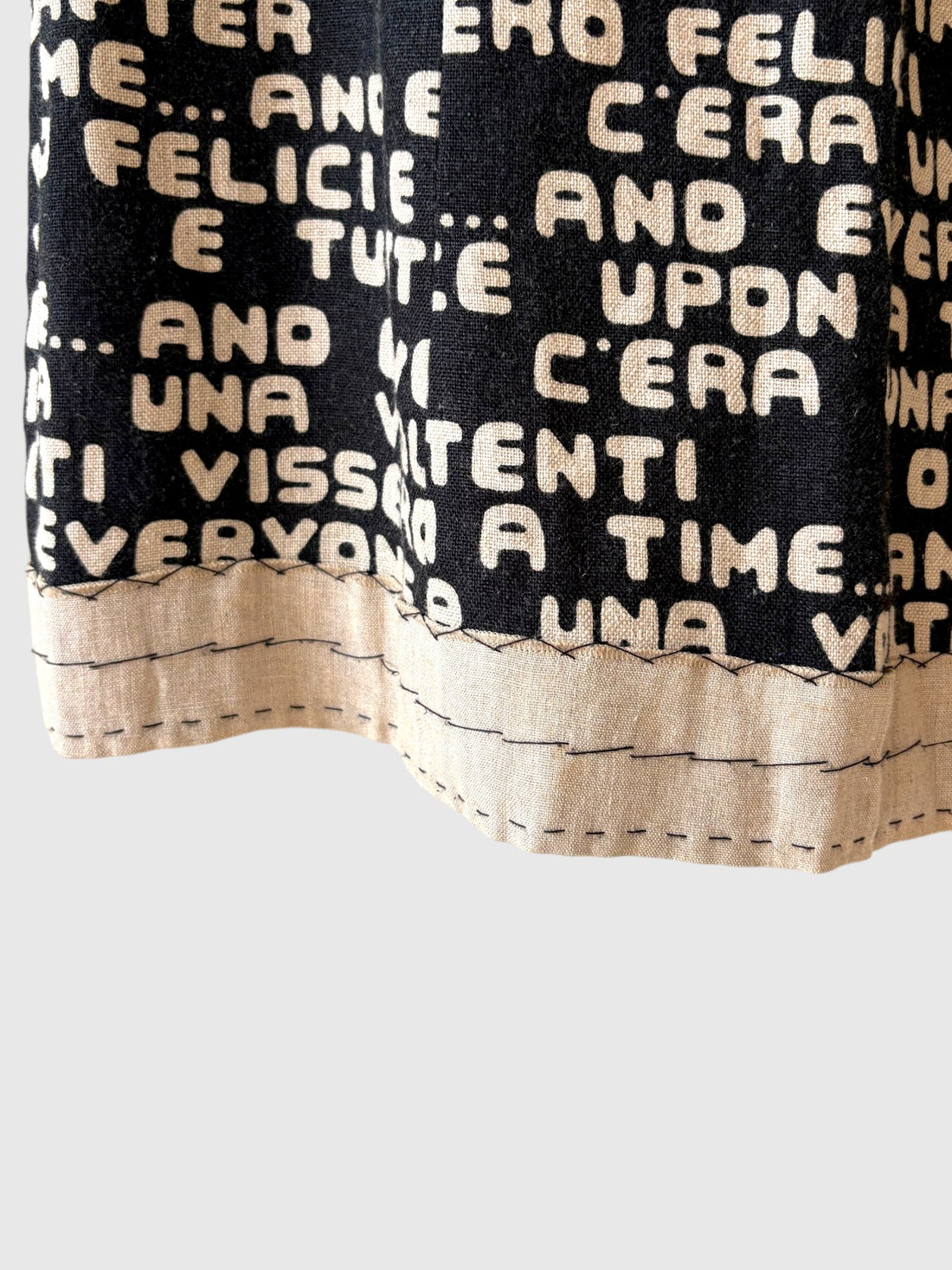 Natural linen trim and contrast stitched hem on vintage Moschino dress