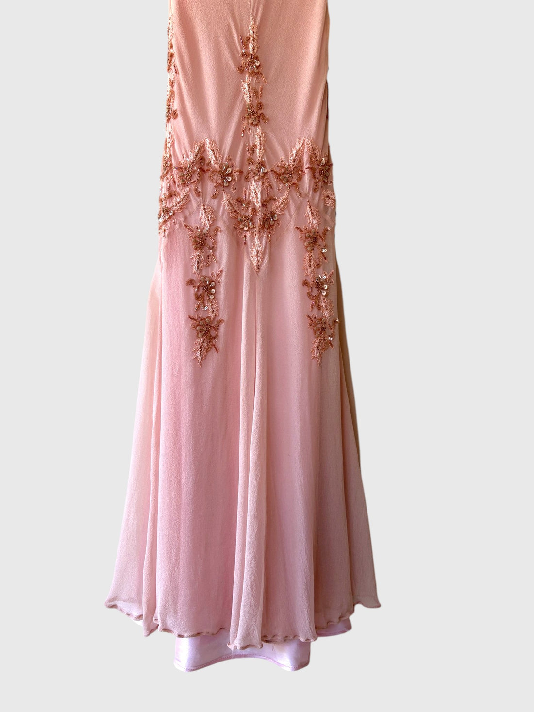 Fairy hemline of pink Adrianna Papell dress