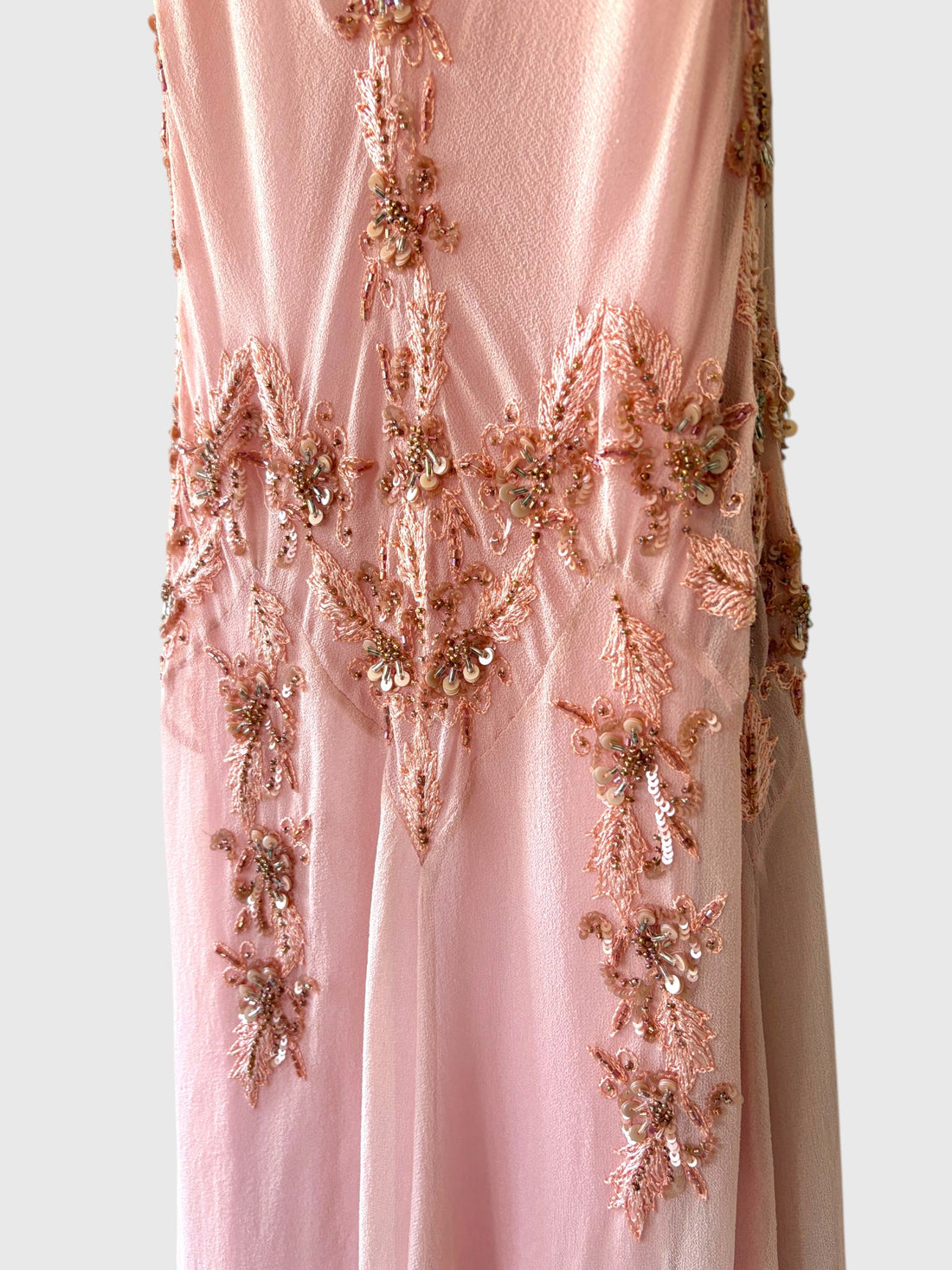 Vintage pink silk gown with intricate floral embroidery and beadwork