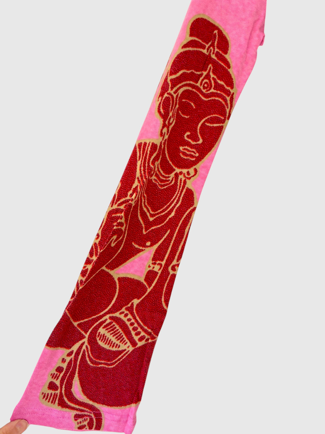 Intricate decorative red figure illustration on pink printed sleeve of vintage Custo Barcelona Morrison Birds top