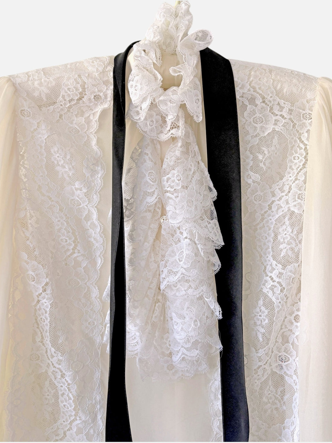 Oscar de la Renta romantic lace blouse with dramatic front ruffle detail