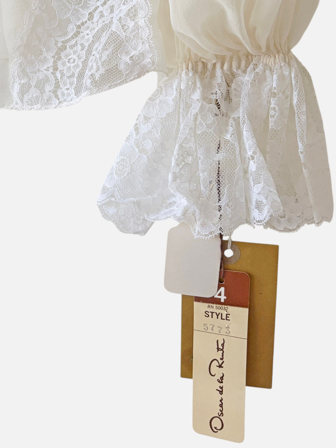 Original Oscar de la Renta retail tags on deadstock vintage blouse