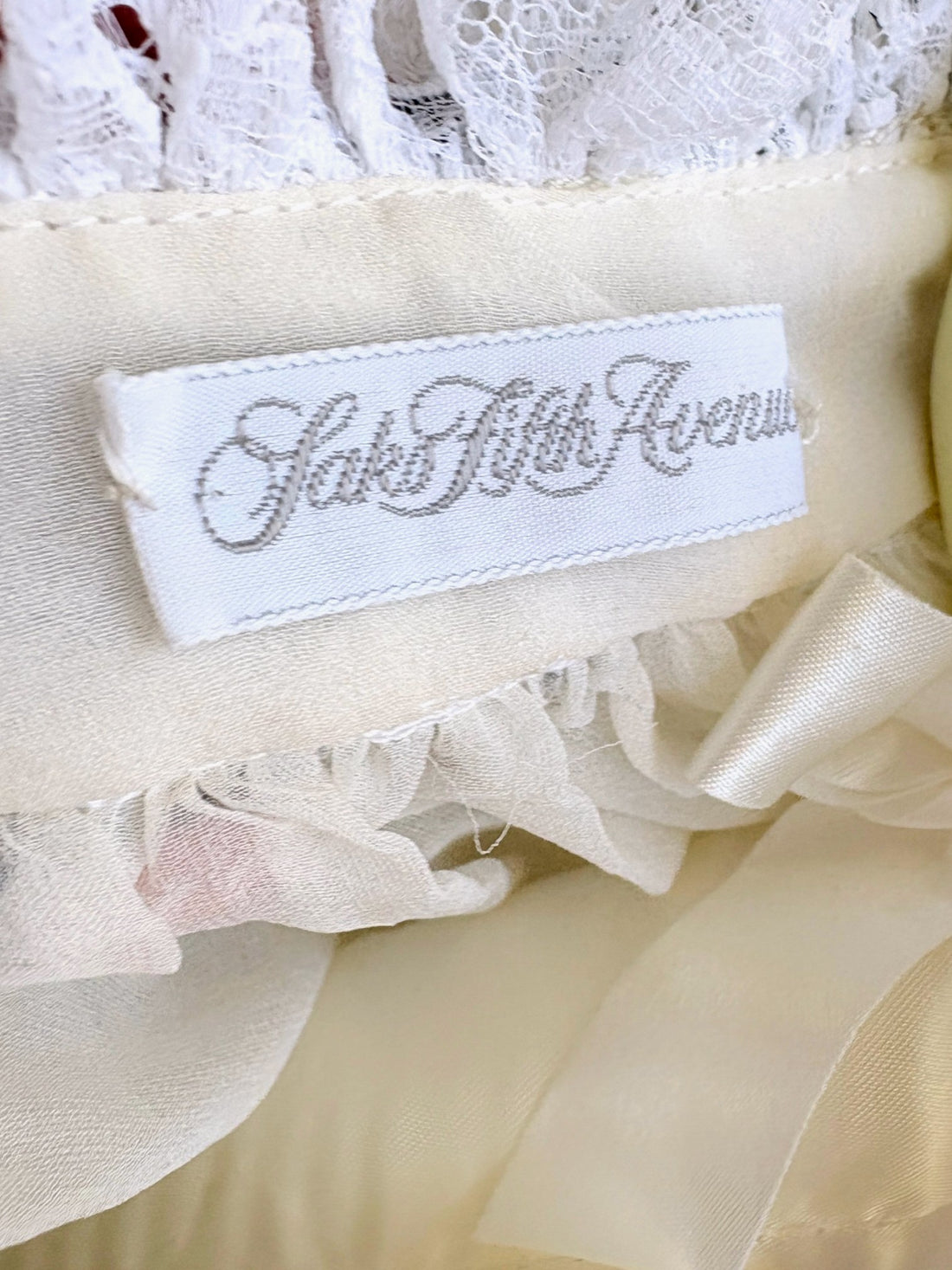 Saks Fifth Avenue label inside vintage Oscar de la Renta blouse
