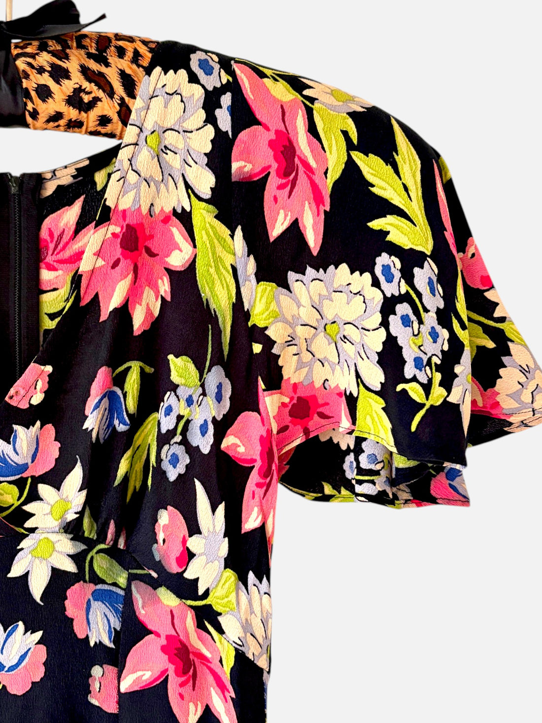 Close up of flutter sleeve detail on Betsey Johnson floral dress