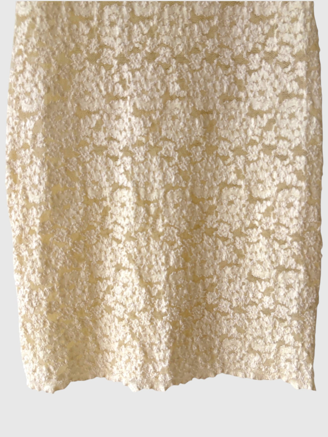 Close up of textured floral lace on vintage Victoria’s Secret dress