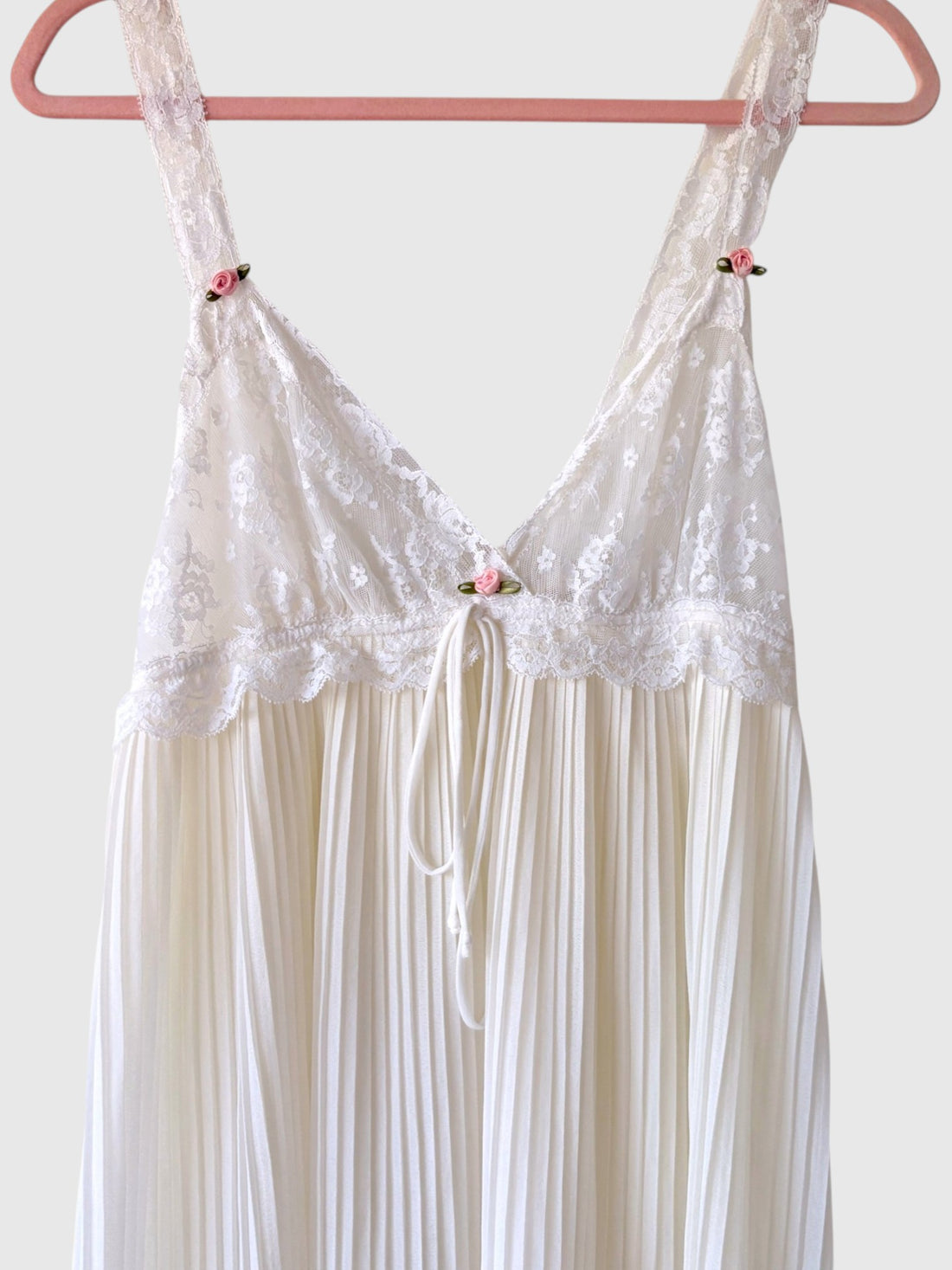 Pink rosebud trim and empire tie detail on vintage nightgown