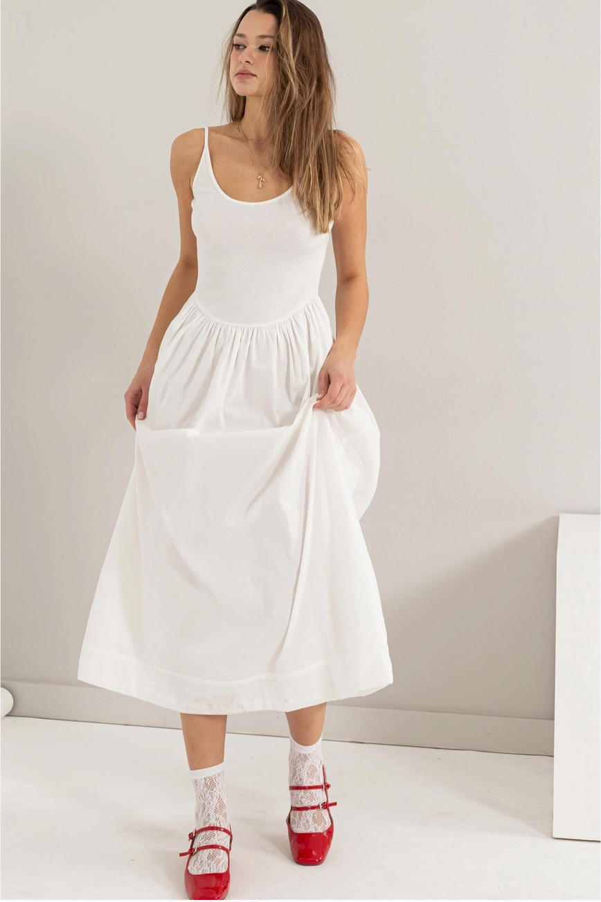 Casual and trendy white maxi dress, with scoop neck front and low back.  