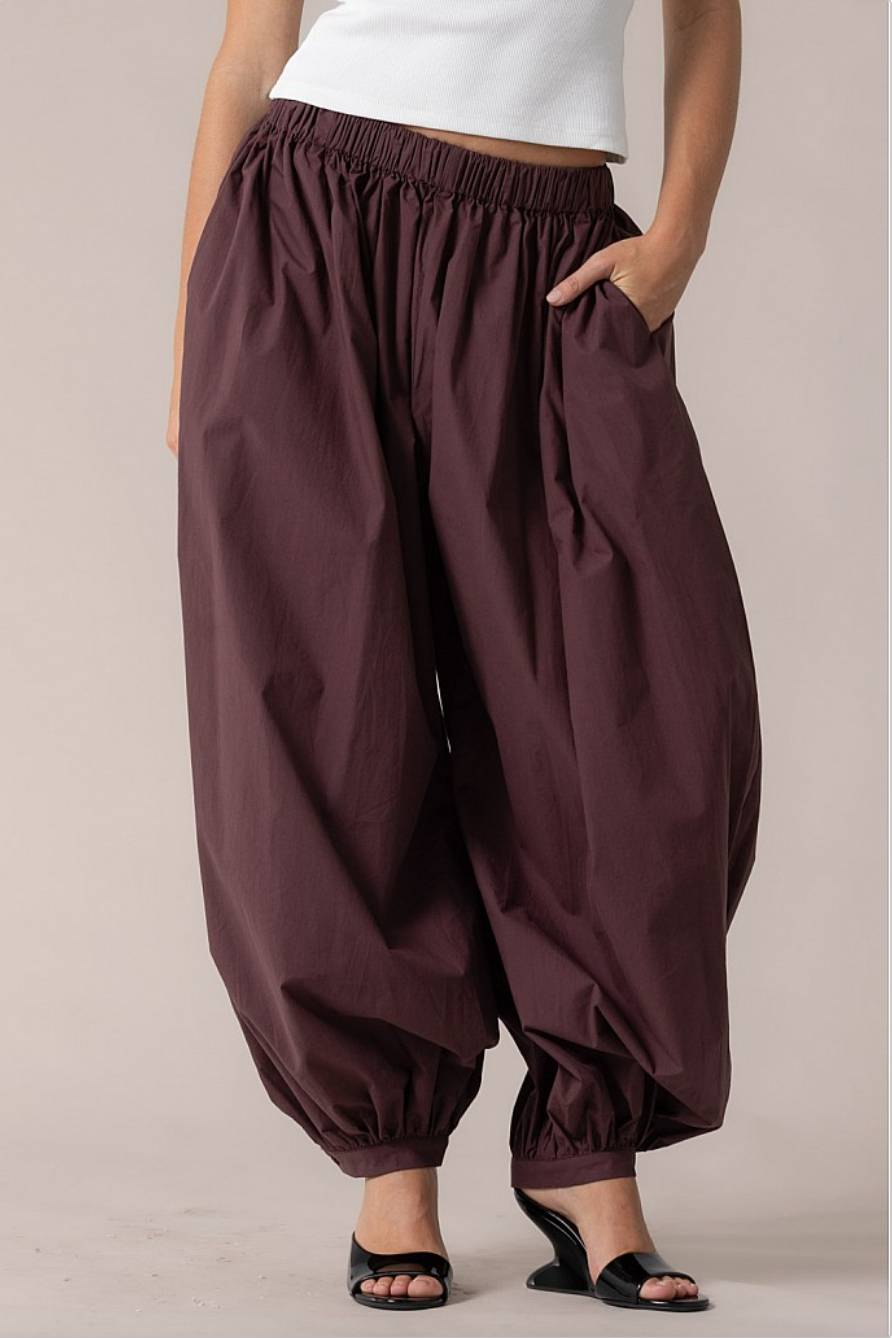 Front detail of merlot cotton balloon harem pants with elastic banded ankles