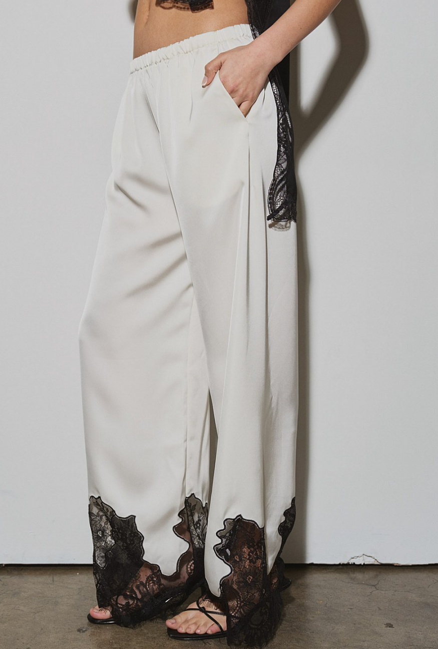 Ivory satin lace-trim trousers with side pocket detail and elastic waistband