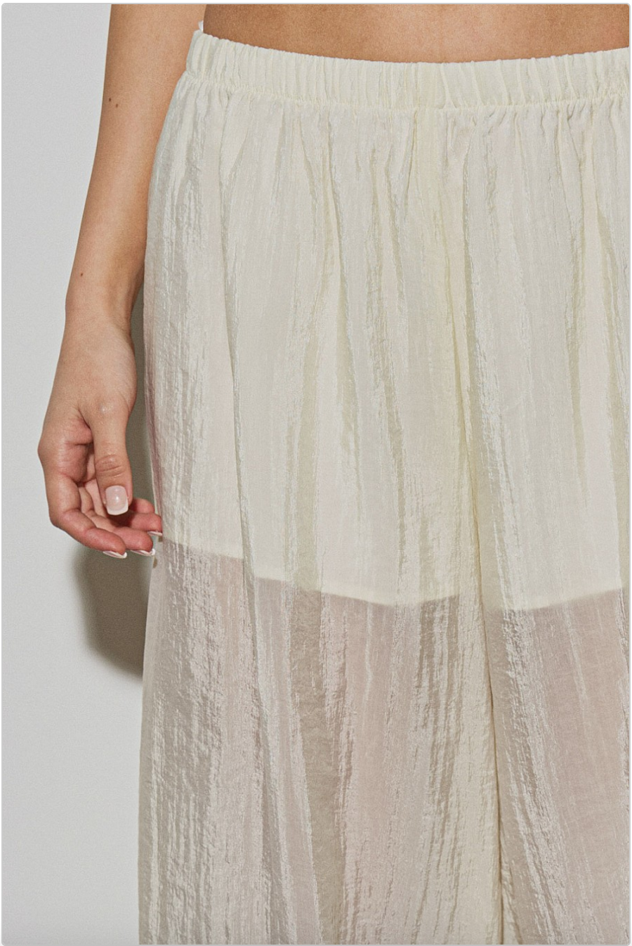 Close-up of Willow Balloon Pant waistband showing elastic waist and textured woven fabric.