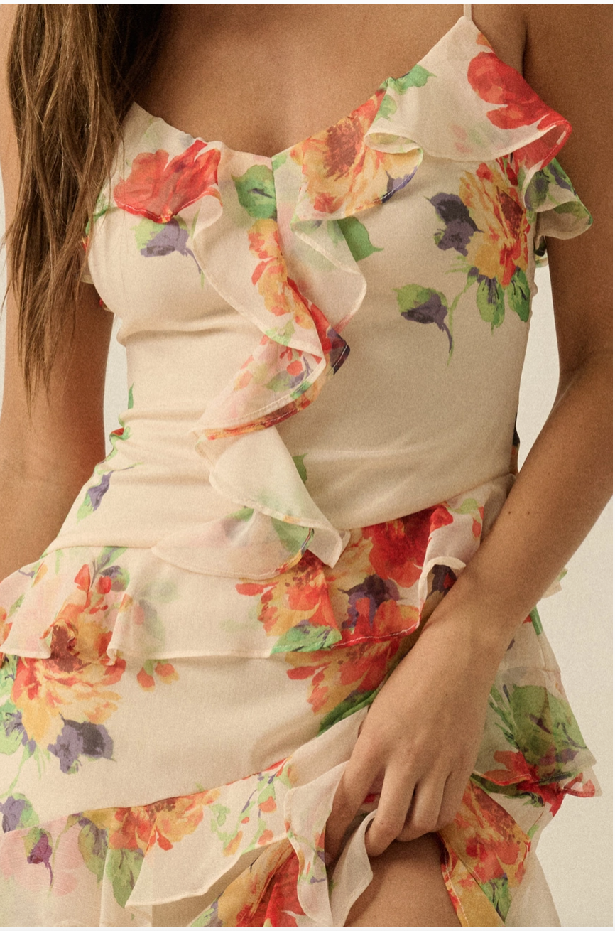 Close-up of floral chiffon dress with sweetheart neckline and ruffle-trimmed bodice in soft romantic print
