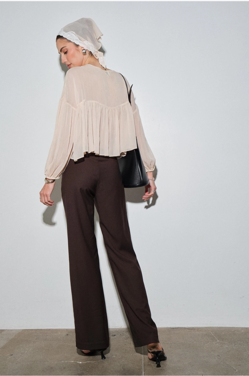 Back view of cropped chiffon babydoll blouse with matching headscarf