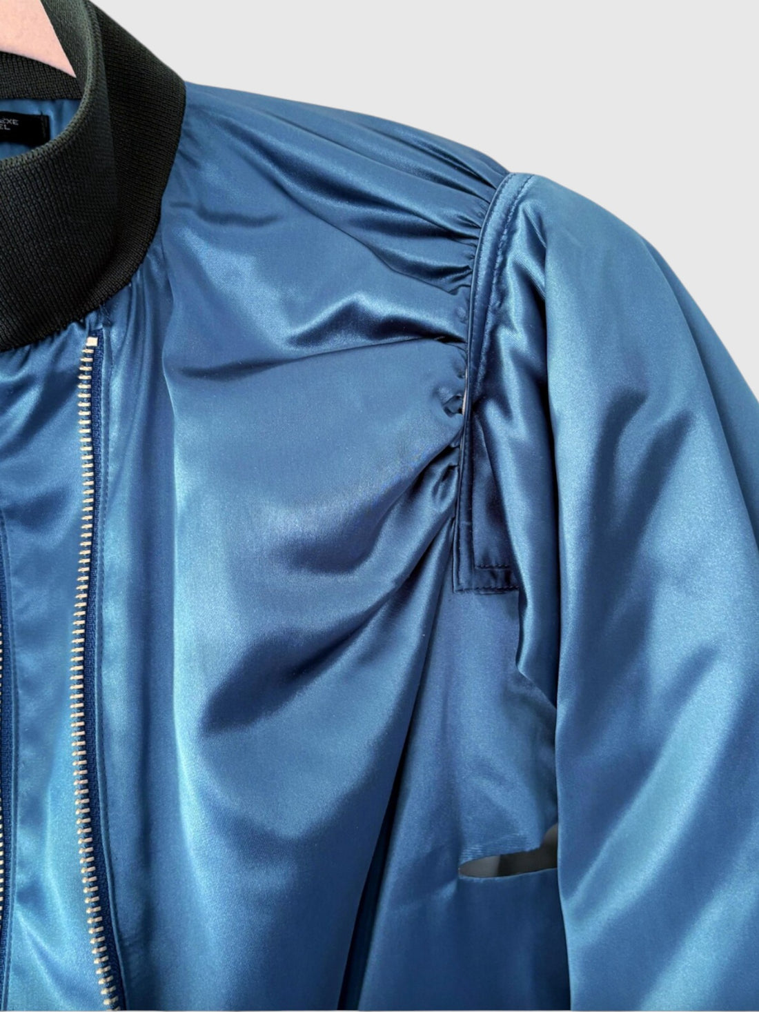 Sculptural gathered shoulder detail on Y’s Yohji Yamamoto satin bomber