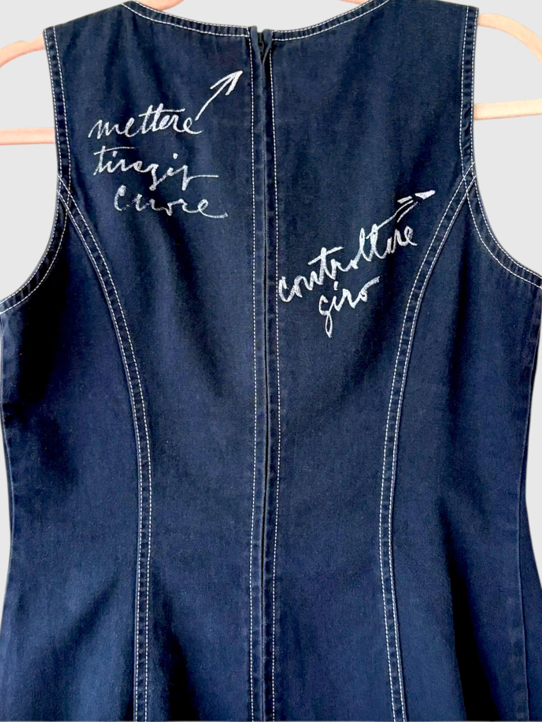 Back script graphics and concealed zipper on vintage Moschino denim dress
