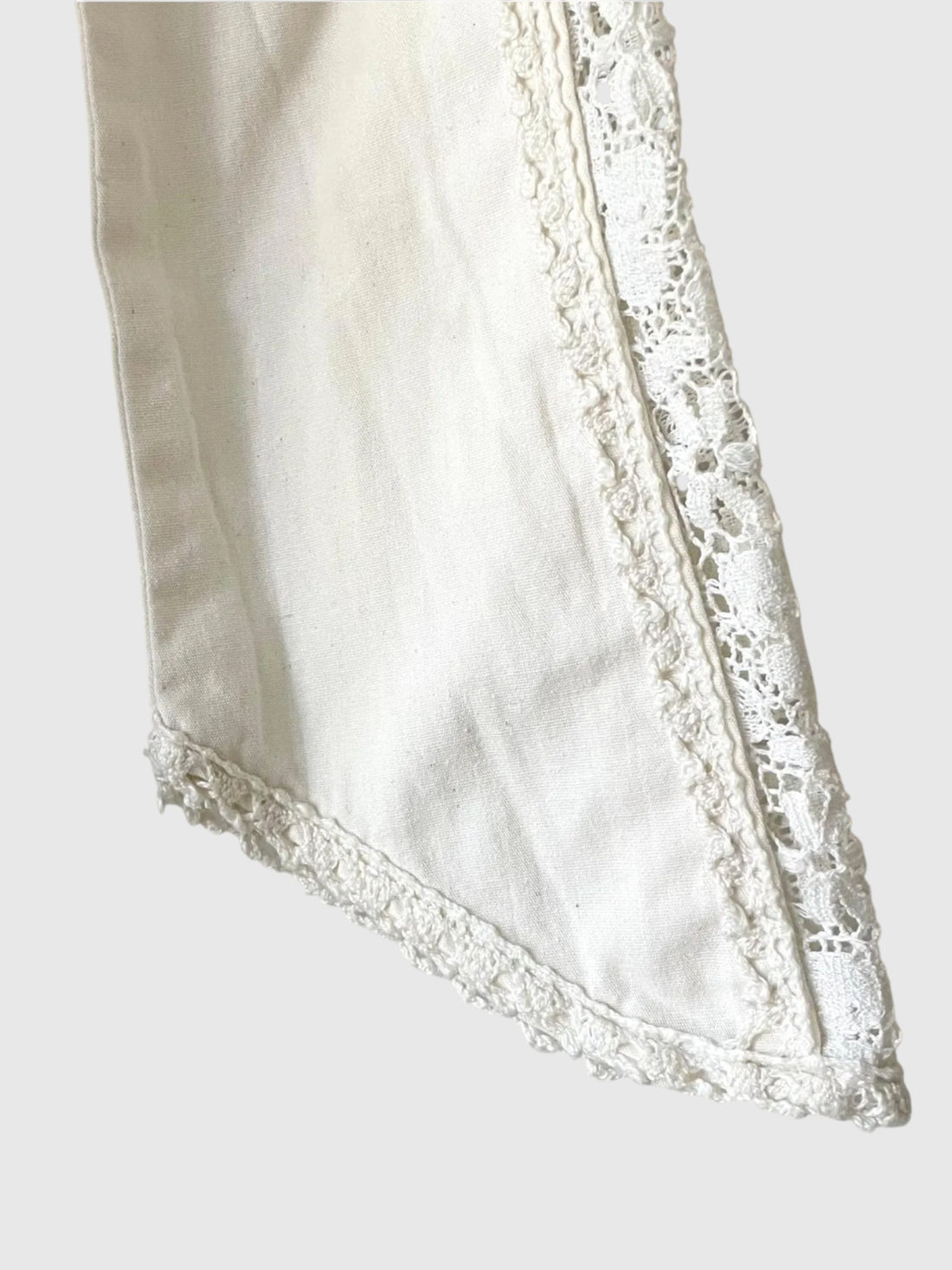Detail of ivory lace inset in long sleeves on 1970s Gunne Sax dress.