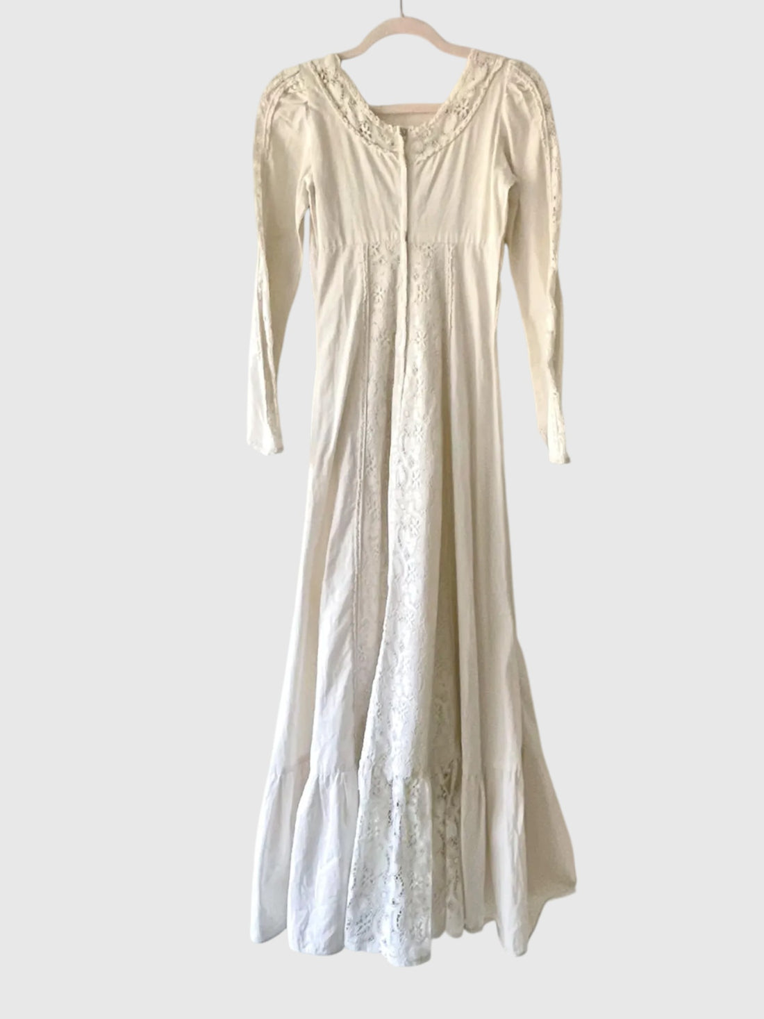 Back full-length view of 1970s Gunne Sax ivory lace maxi dress.