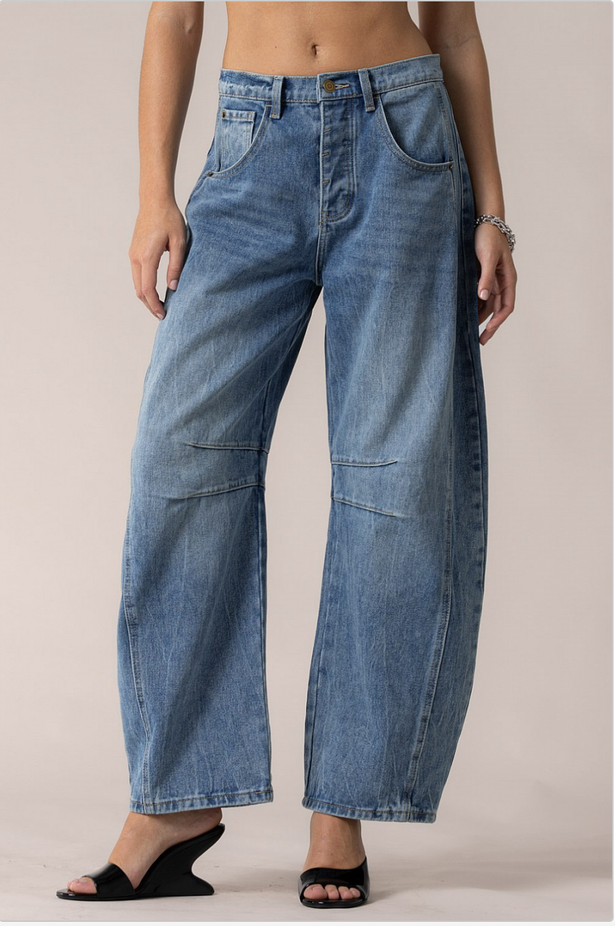 Front view of Cloud Nine barrel jeans with relaxed fit, knee seam details, and tapered hem.