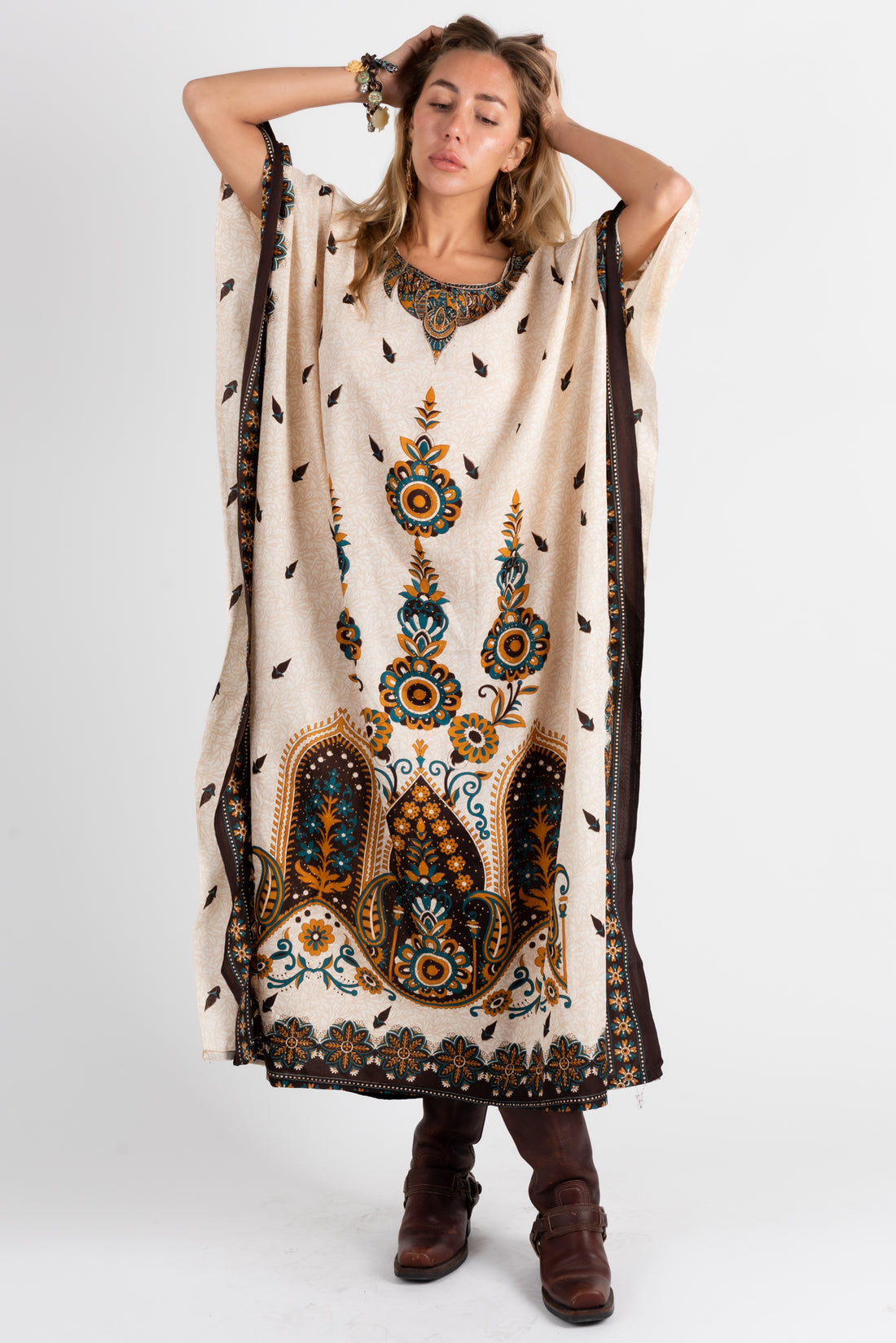 Metallic gold and teal paisley print detail on vintage 1970s kaftan